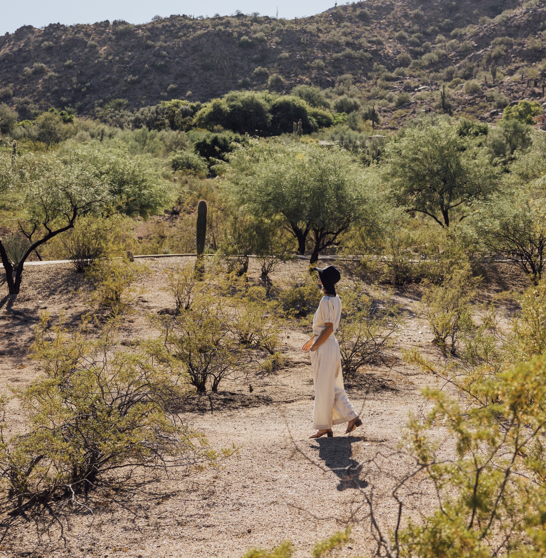 Woman walking in desert