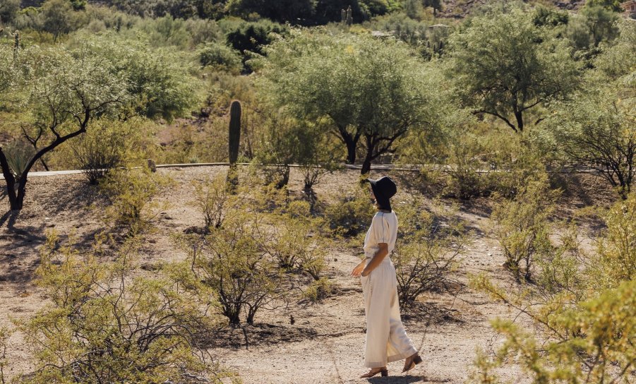 Woman walking in desert