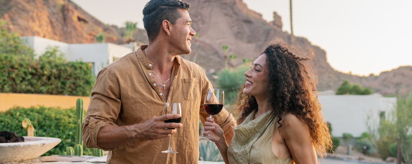 Couple on patio drinking wine