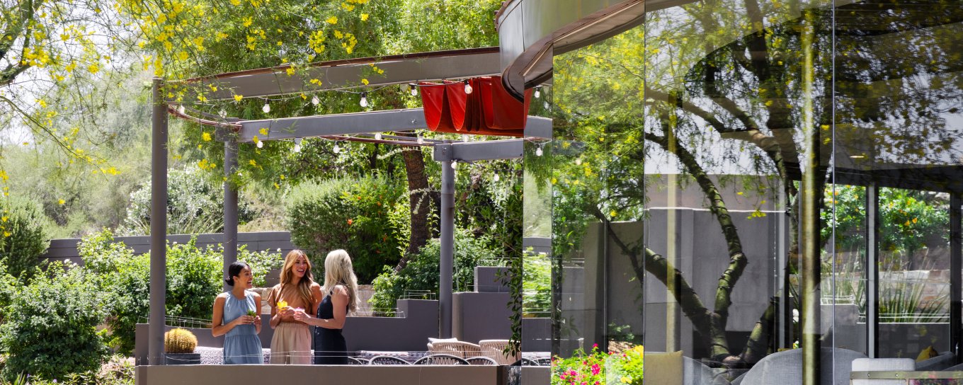 Women on jade bar patio