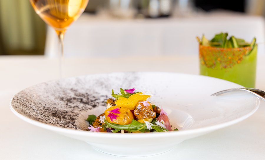 Beet salad with glass of wine