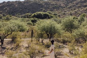 Woman walking in desert