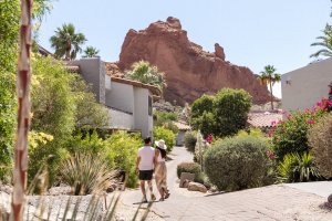 Couple walking through guestrooms