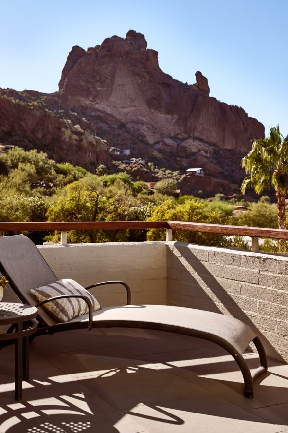 Mountain Casita patio with lounge chair and stunning view of Praying Monk.