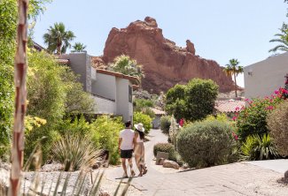 Couple walking through guestrooms