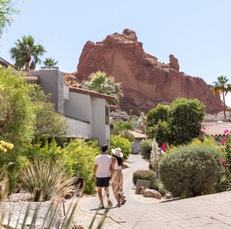 Couple walking on resort grounds